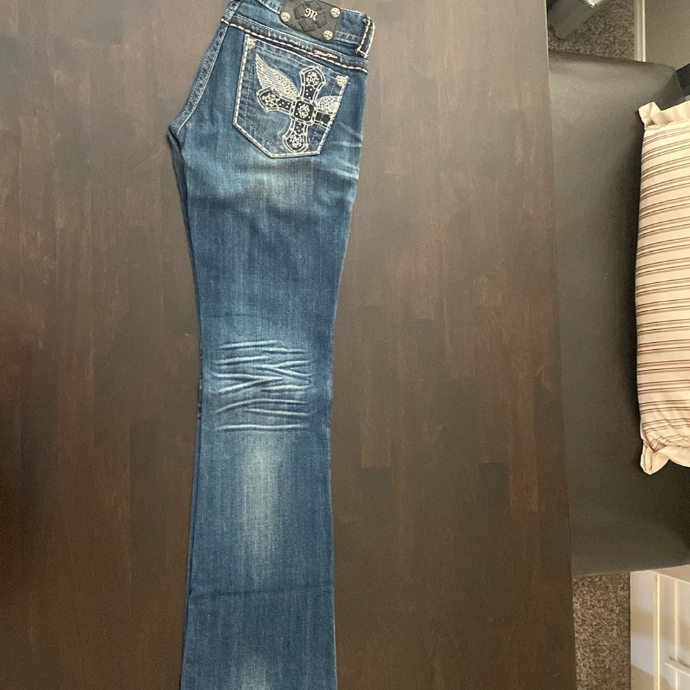 Miss Me distressed bootcut jeans!